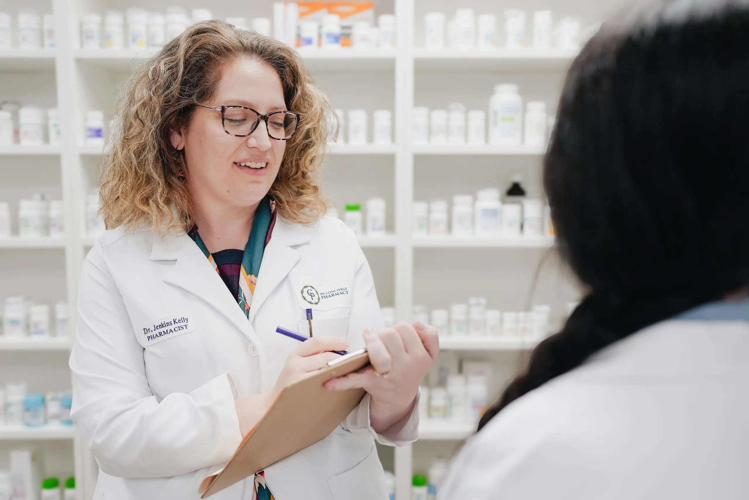 Pharmacist consultation in a modern pharmacy setting